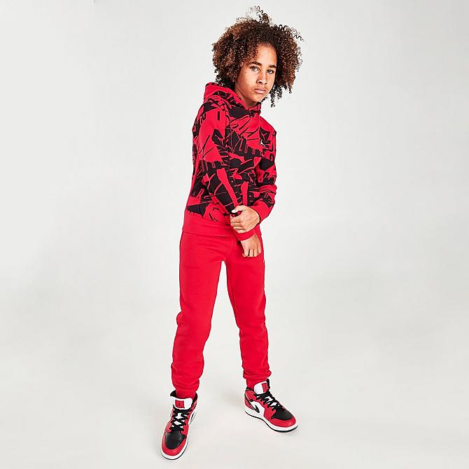 Front Three Quarter view of Boys' Jordan Essentials Allover Print Hoodie in Red/Black Click to zoom