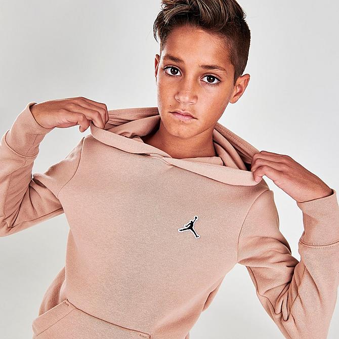 On Model 5 view of Boys' Jordan Essentials Logo Hoodie in Light Pink Click to zoom