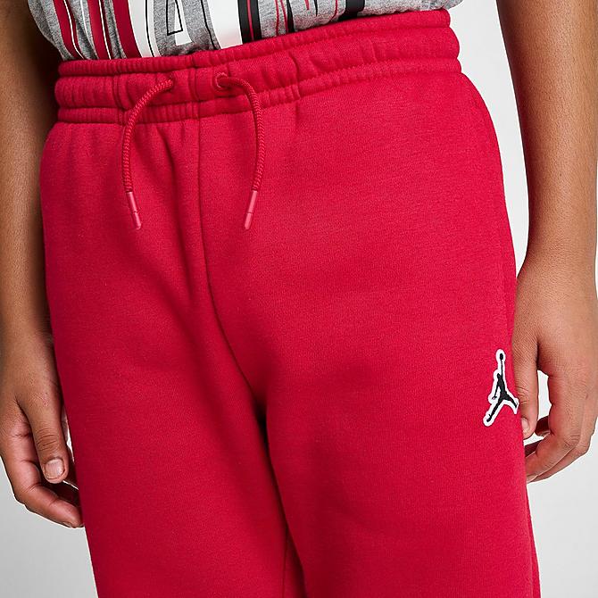On Model 5 view of Boys' Jordan Essentials Jogger Sweatpants in Gym Red Click to zoom