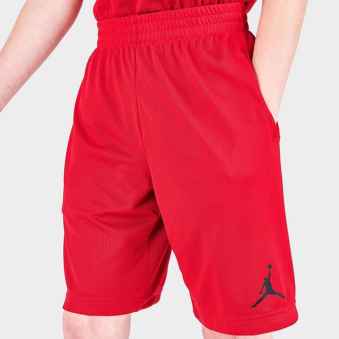 On Model 5 view of Kids' Jordan Reversible Mesh Shorts in Gym Red Click to zoom