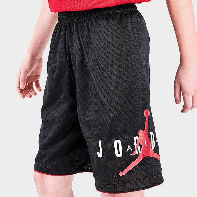 On Model 6 view of Kids' Jordan Reversible Mesh Shorts in Gym Red Click to zoom