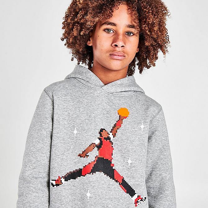 On Model 5 view of Kids' Nike Holiday Jumpman Pullover Hoodie in Grey Click to zoom