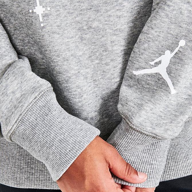 On Model 6 view of Kids' Nike Holiday Jumpman Pullover Hoodie in Grey Click to zoom
