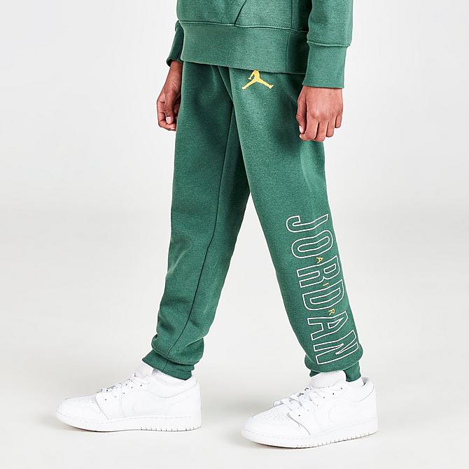 Front Three Quarter view of Boys' Jordan Air Utility Jogger Pants in Noble Green Click to zoom