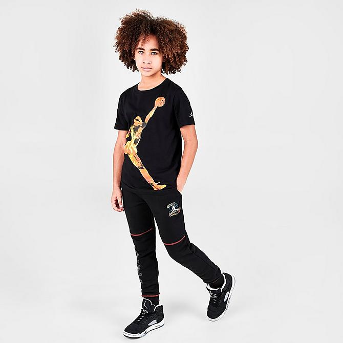 Front Three Quarter view of Boys' Air Jordan Comic Ooze Jogger Pants in Black Click to zoom