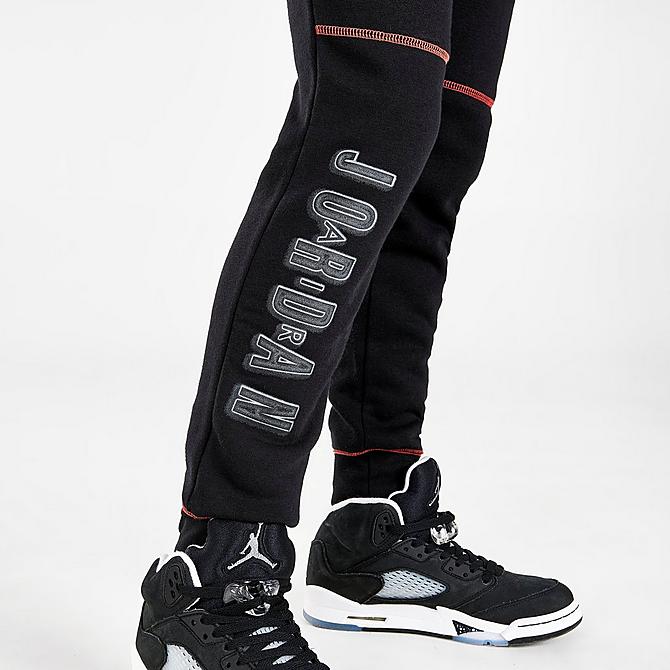 On Model 6 view of Boys' Air Jordan Comic Ooze Jogger Pants in Black Click to zoom