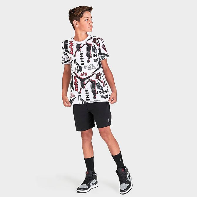 Front Three Quarter view of Boys' Jordan Throwback Allover Print T-Shirt in White/Black Click to zoom