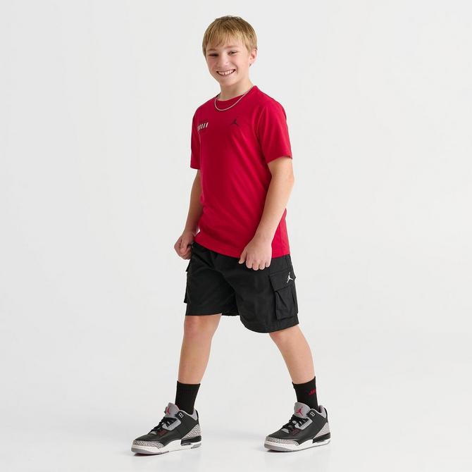 [angle] view of Kids' Jordan Courtyard T-Shirt in Gym Red Click to zoom