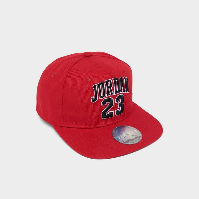 Left view of Big Kids' Jordan Jersey Snapback Hat in Gym Red Click to zoom
