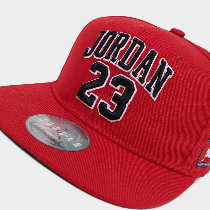 Bottom view of Big Kids' Jordan Jersey Snapback Hat in Gym Red Click to zoom