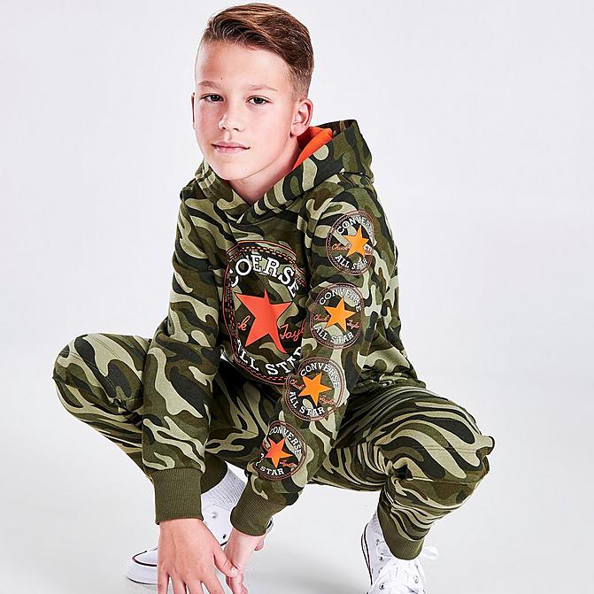 Front view of Boys' Converse Camo Pullover Hoodie in Orange/Camo Green Click to zoom