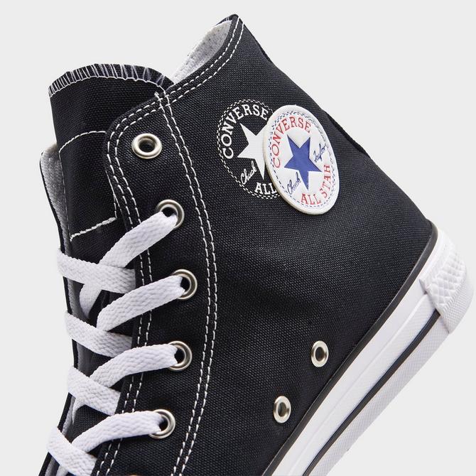 Junior black clearance and white converse