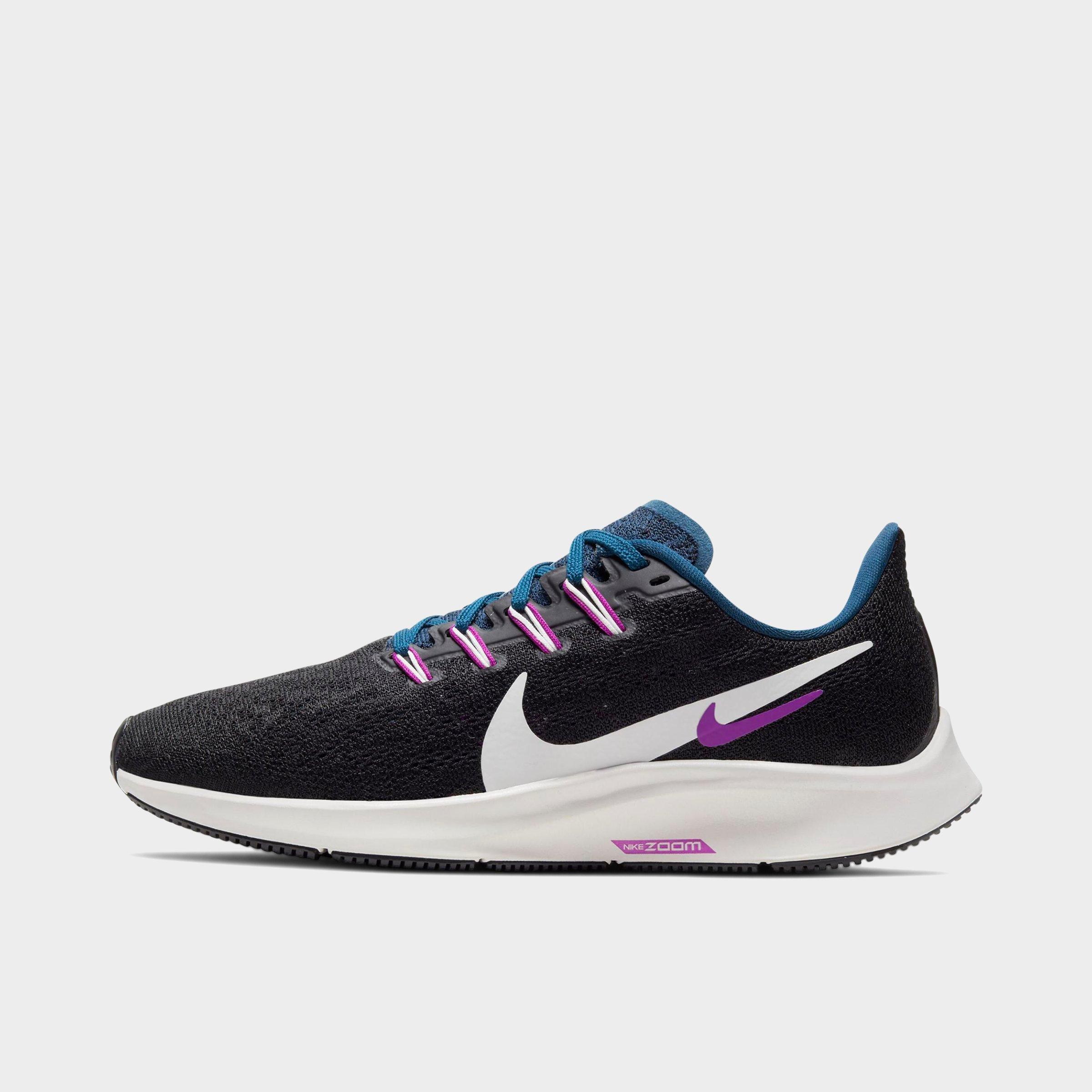 black and blue nike running shoes