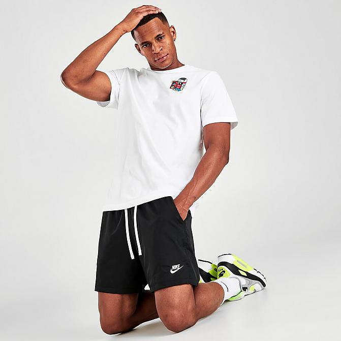 Front view of Men's Nike Sportswear Flow Woven Shorts in Black/White Click to zoom