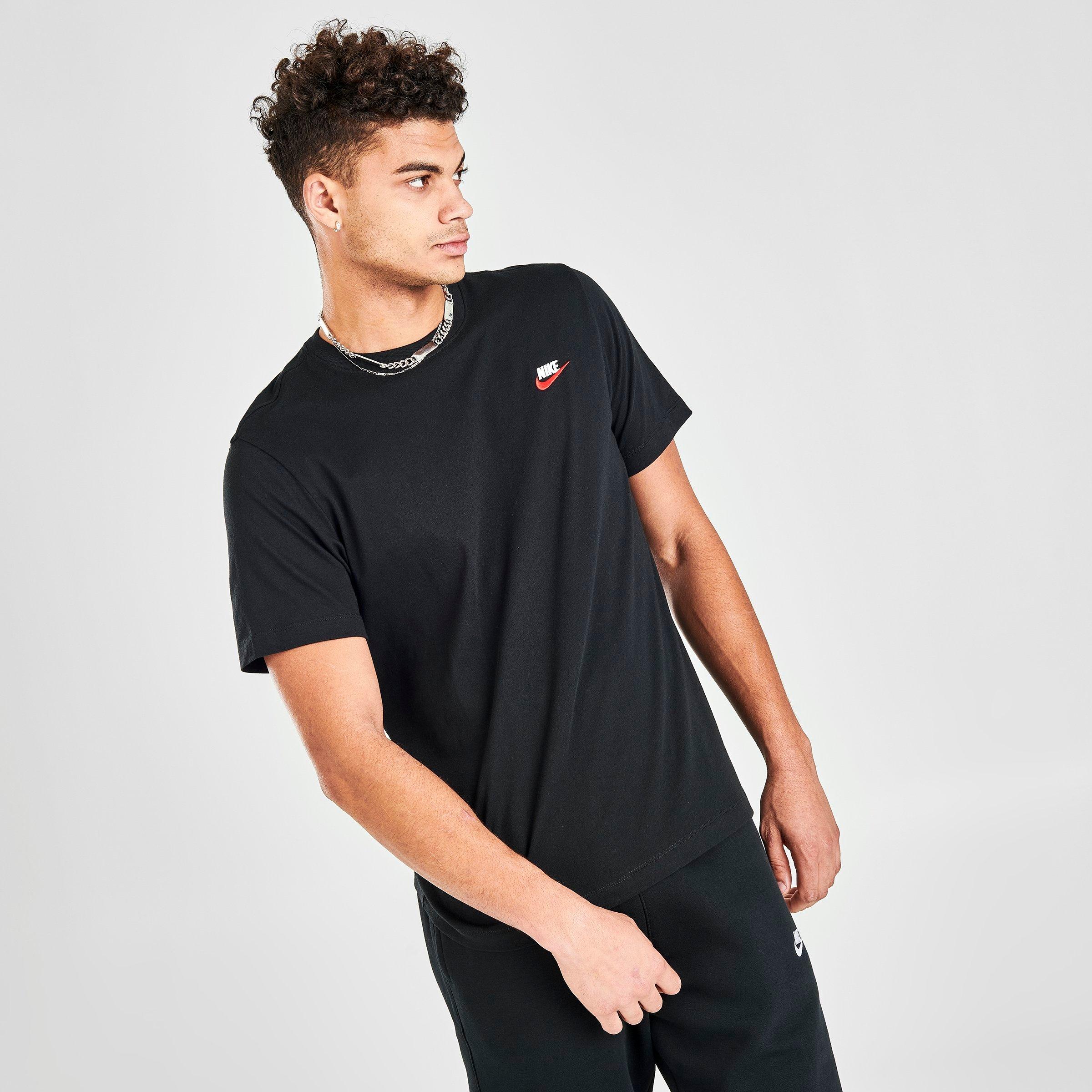 white and navy nike shirt