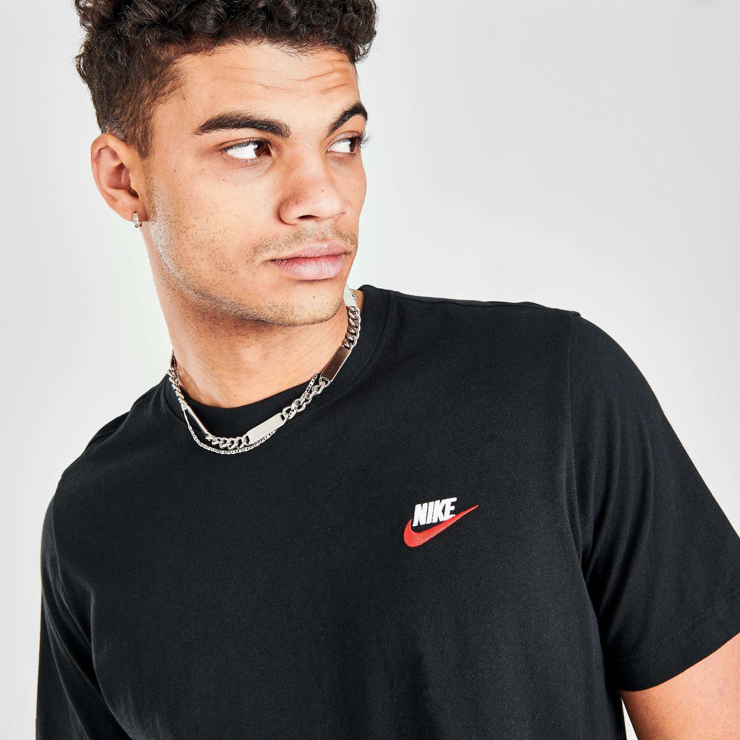 white black and red nike shirt