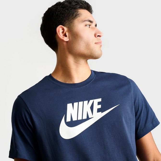 White and navy store blue nike shirt