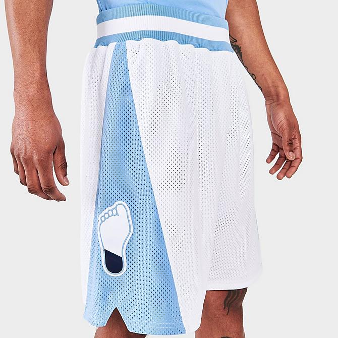 On Model 5 view of Men's Mitchell & Ness North Carolina Tar Heels College Michael Jordan Basketball Shorts in White/Carolina Blue Click to zoom
