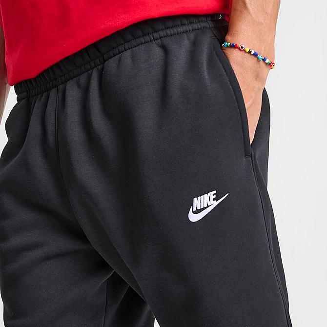 On Model 5 view of Nike Sportswear Club Fleece Cuffed Jogger Pants in Black/Black/White Click to zoom
