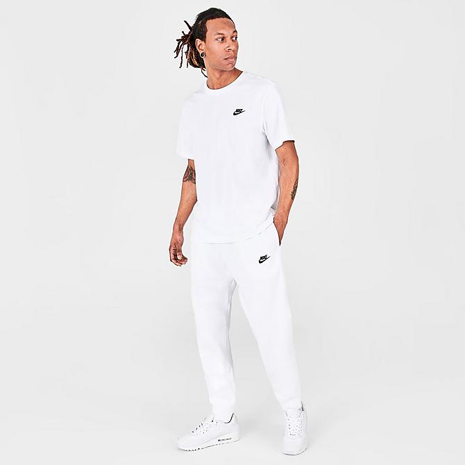Front Three Quarter view of Nike Sportswear Club Fleece Cuffed Jogger Pants in White/White/Black Click to zoom