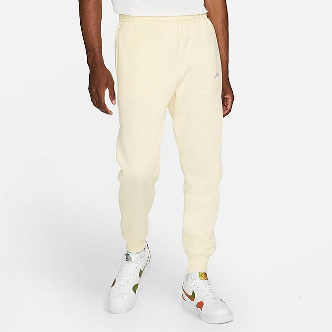 Front Three Quarter view of Nike Sportswear Club Fleece Cuffed Jogger Pants in Coconut Milk/Coconut Milk/White Click to zoom