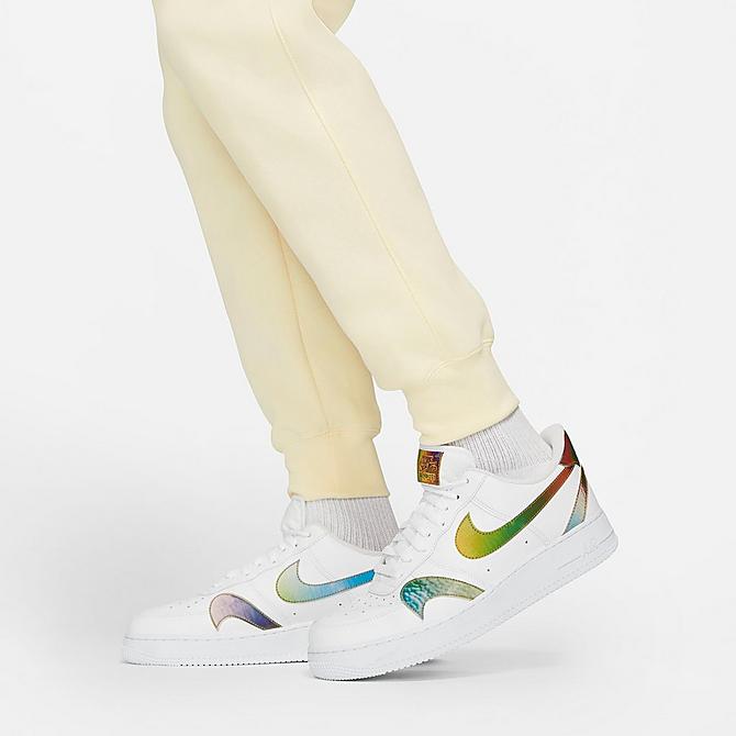 On Model 6 view of Nike Sportswear Club Fleece Cuffed Jogger Pants in Coconut Milk/Coconut Milk/White Click to zoom