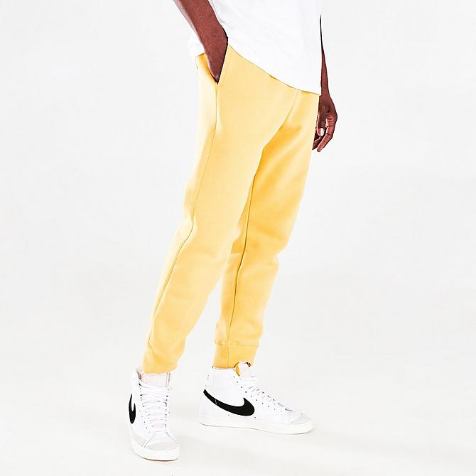 Back Left view of Nike Sportswear Club Fleece Cuffed Jogger Pants in Saturn Gold/Saturn Gold/White Click to zoom