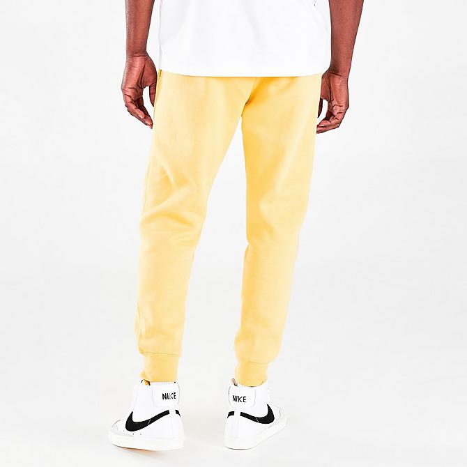 Back Right view of Nike Sportswear Club Fleece Cuffed Jogger Pants in Saturn Gold/Saturn Gold/White Click to zoom