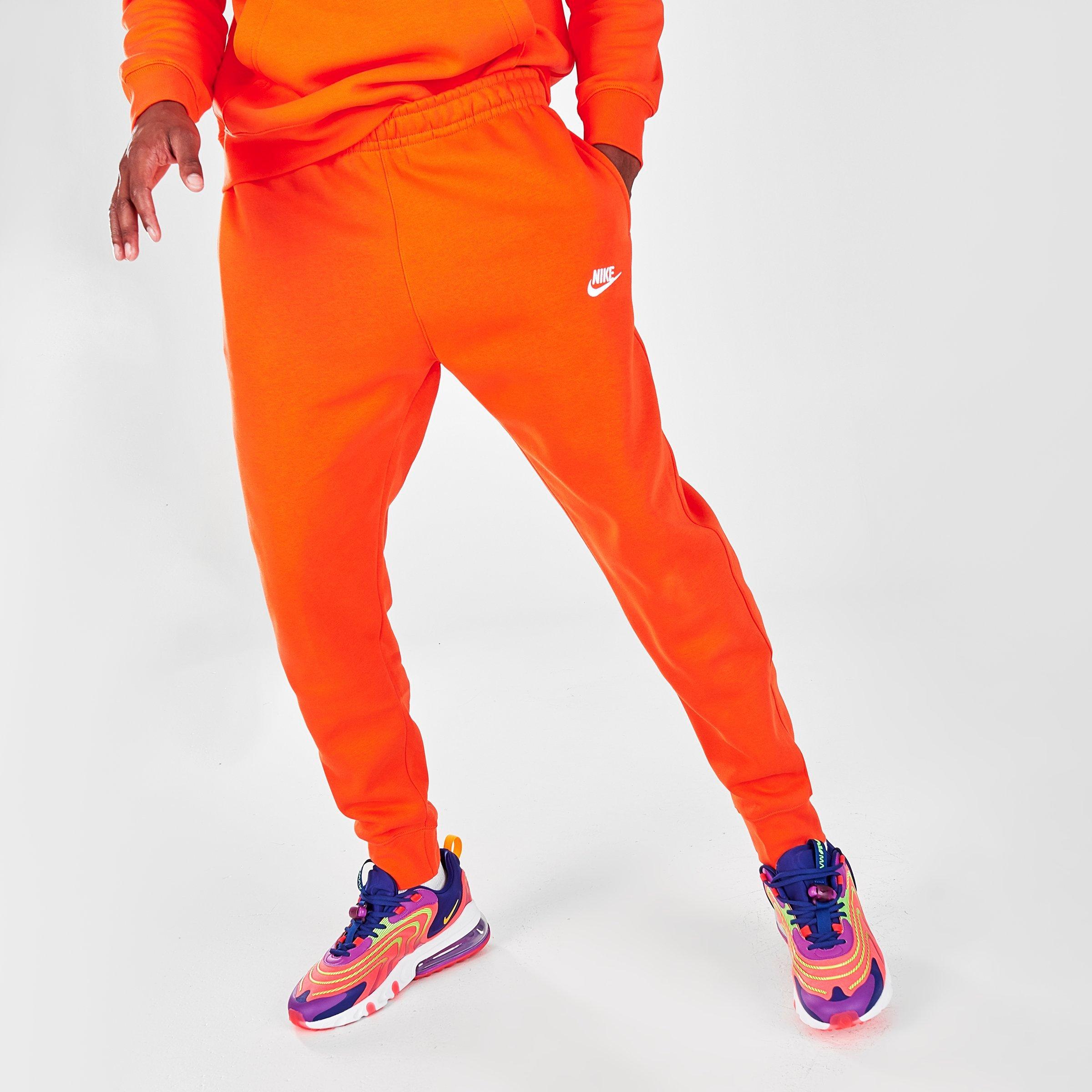 orange nike fleece pants