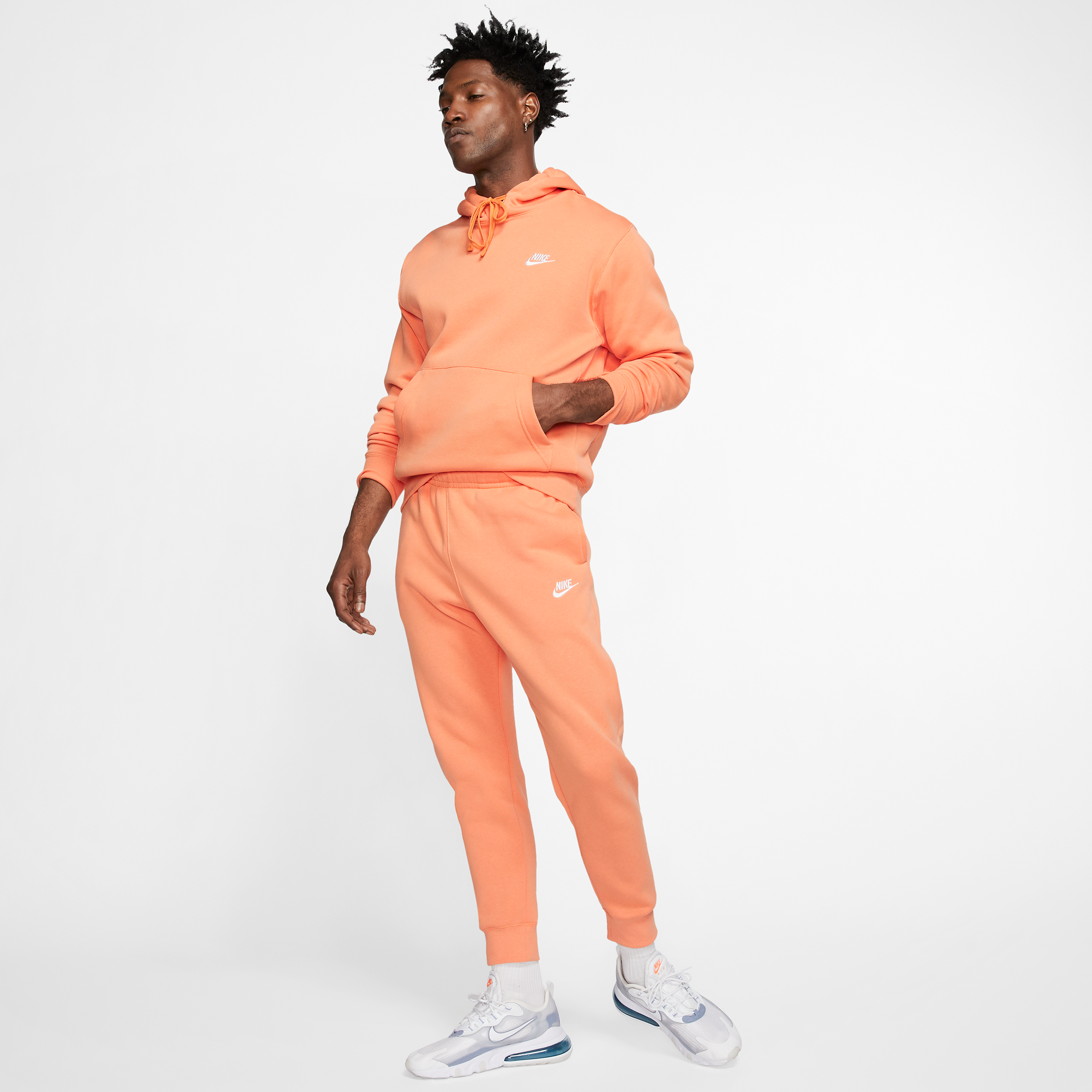 orange nike jogging pants