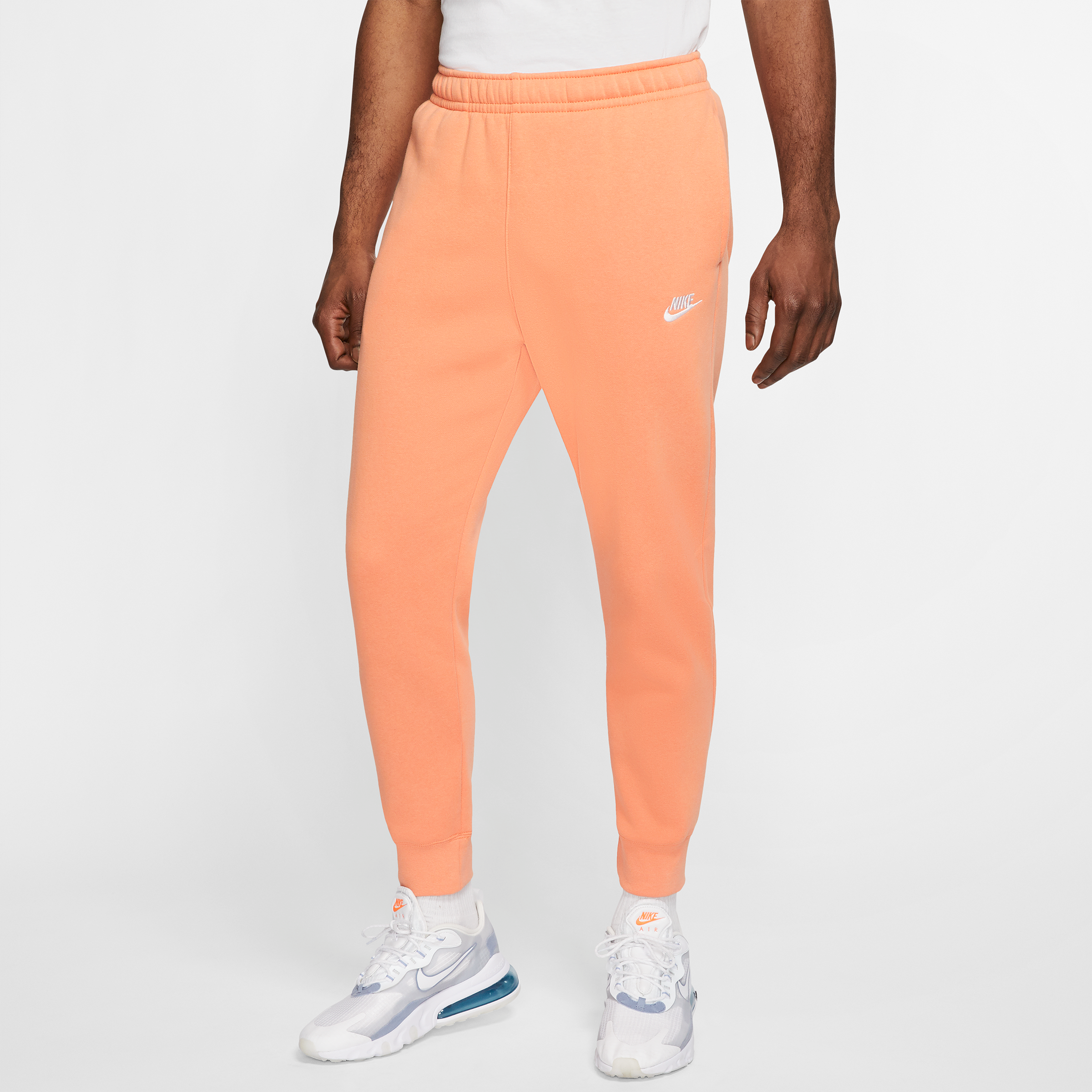 orange nike pants