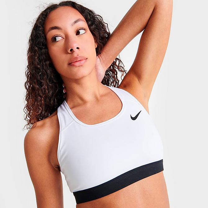 On Model 5 view of Women's Nike Dri-FIT Swoosh Medium-Support Sports Bra in White/Black/Black Click to zoom