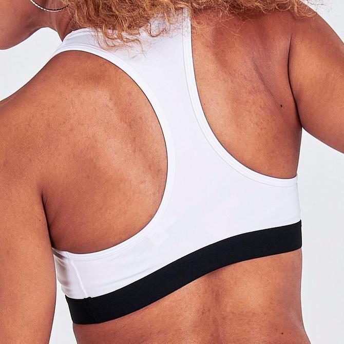 On Model 6 view of Women's Nike Dri-FIT Swoosh Medium-Support Sports Bra in White/Black/Black Click to zoom