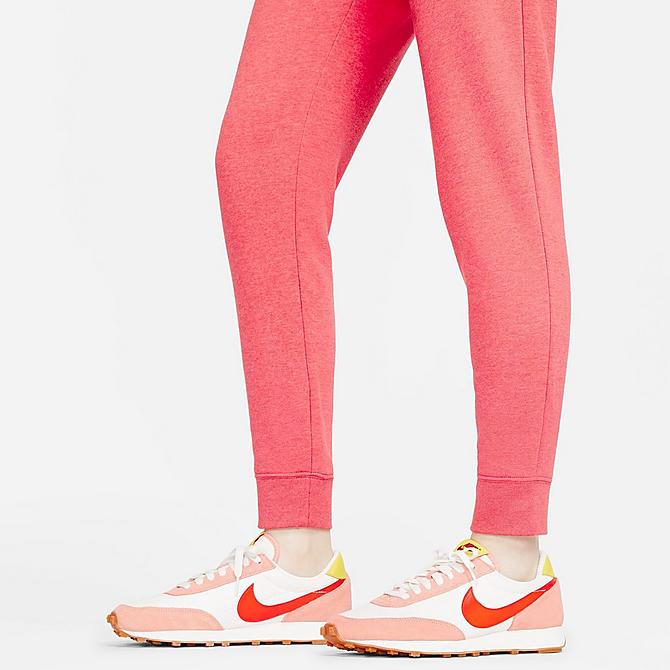 On Model 5 view of Women's Nike Sportswear Fleece Jogger Pants in Gypsy Rose/Heather/White Click to zoom