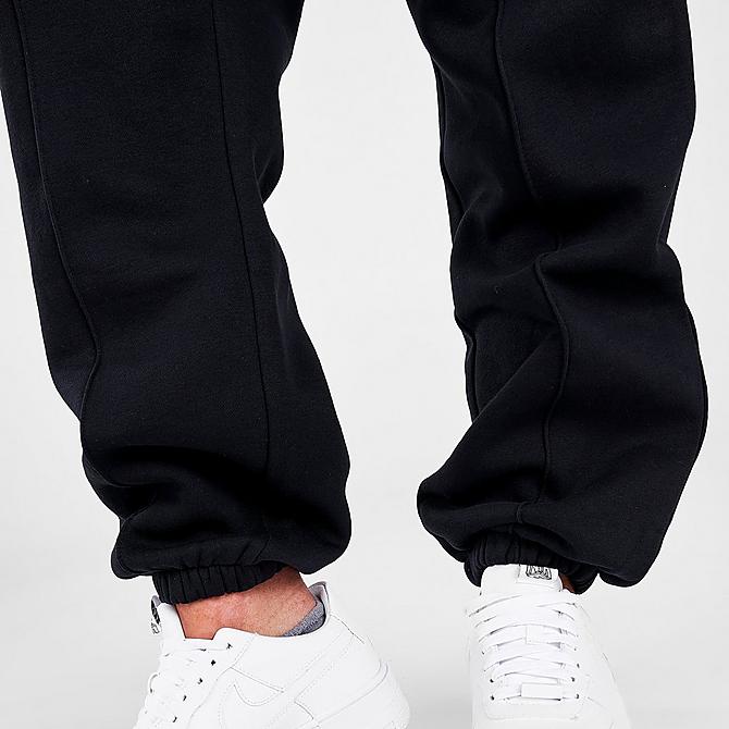 On Model 6 view of Women's Nike Sportswear Essential Fleece Jogger Pants in Black/White Click to zoom