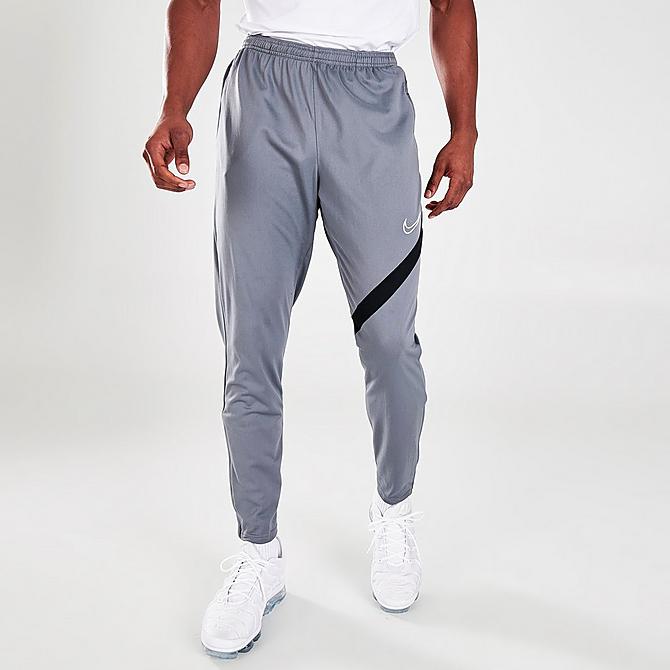 Front Three Quarter view of Men's Nike Dri-FIT Academy Pro Soccer Pants in Smoke Grey Click to zoom