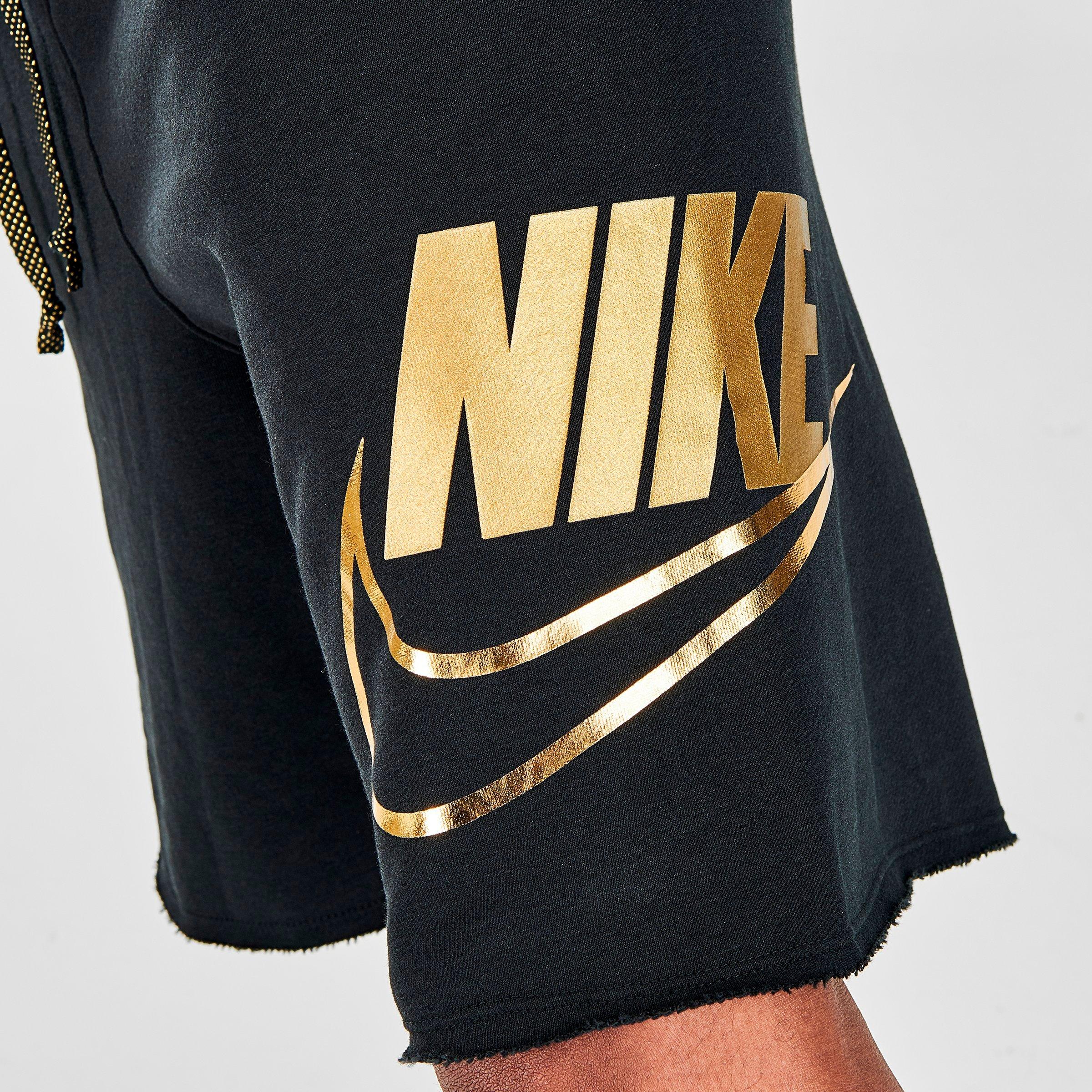 gold nike shorts mens