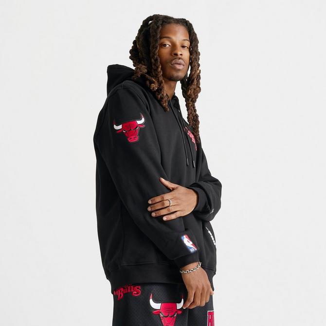 [angle] view of Men's Pro Standard Chicago Bulls NBA Souvenir Fleece Pullover Hoodie in Black/Red Click to zoom