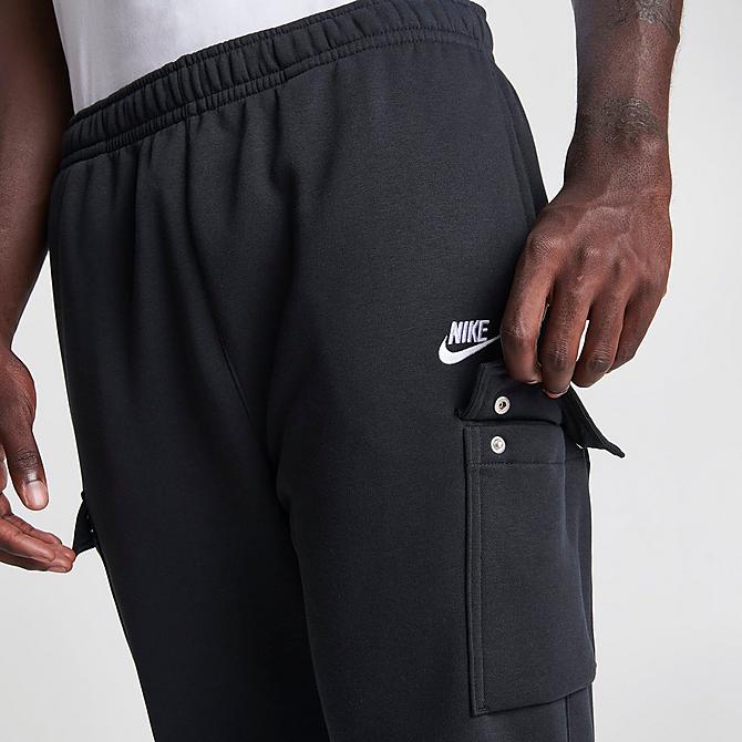 On Model 5 view of Men's Nike Sportswear Club Fleece Cargo Jogger Pants in Black/Black/White Click to zoom
