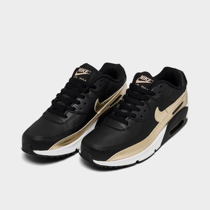 Black and best sale gold kids nike