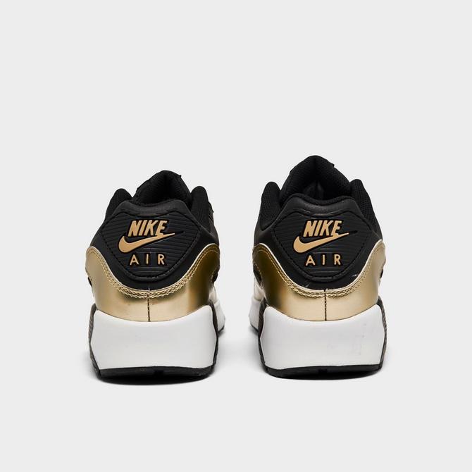 boys black and gold nikes