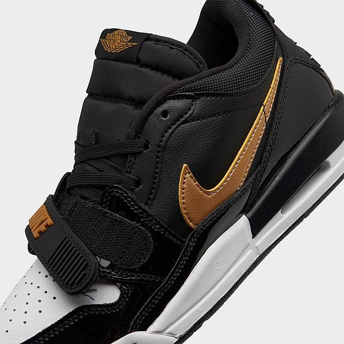 Front view of Boys' Big Kids' Jordan Legacy 312 Low Off-Court Shoes in Black/Metallic Gold/White Click to zoom