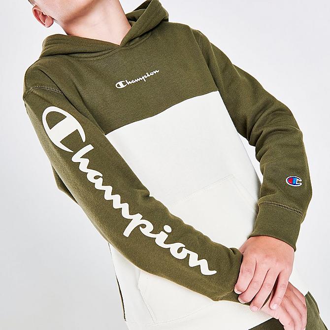 On Model 5 view of Boys' Champion Arm Hit Pullover Hoodie in Olive/White Click to zoom