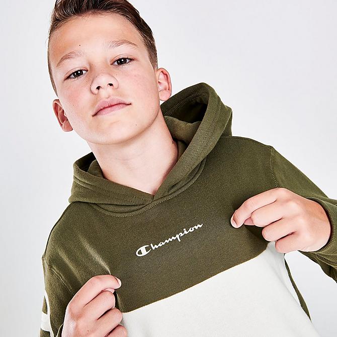 On Model 6 view of Boys' Champion Arm Hit Pullover Hoodie in Olive/White Click to zoom