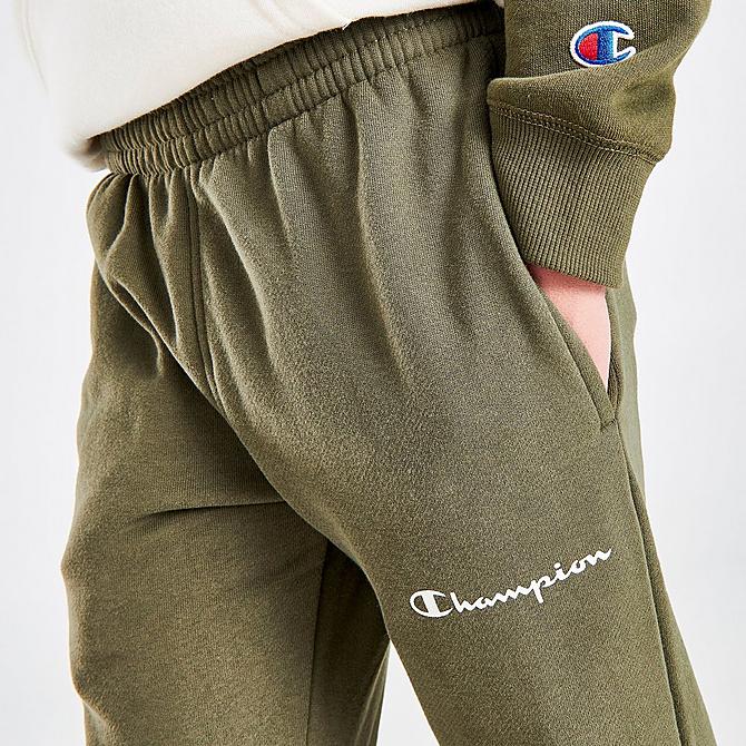 On Model 5 view of Boys' Champion Small Script Jogger Pants in Olive Click to zoom