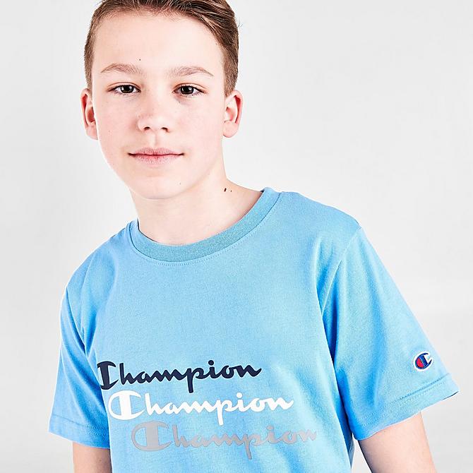 On Model 5 view of Boys' Champion Triple Script T-Shirt and Shorts Set in Blue Click to zoom