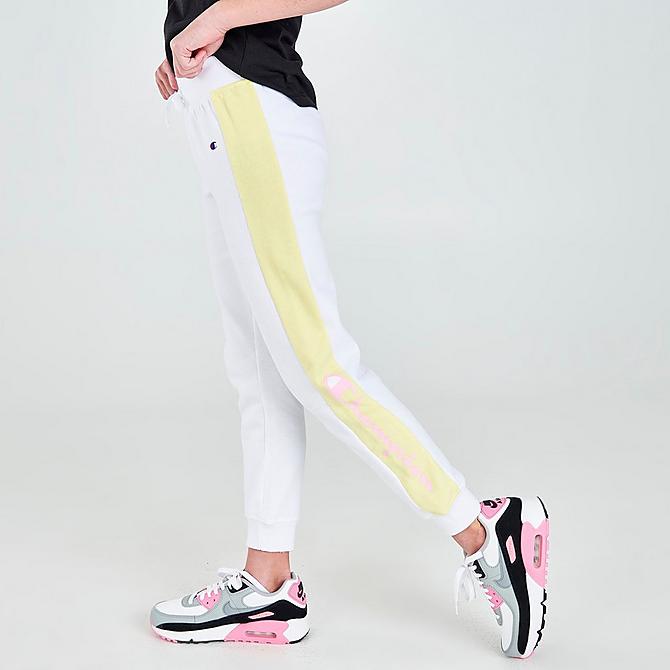 Back Left view of Girls' Champion Smiley Script Logo Jogger Pants in White/Pink/Yellow Click to zoom