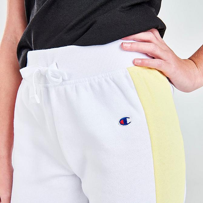 On Model 5 view of Girls' Champion Smiley Script Logo Jogger Pants in White/Pink/Yellow Click to zoom