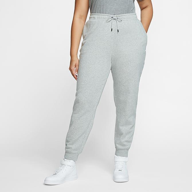 Front Three Quarter view of Women's Nike Sportswear Essential Jogger Pants (Plus Size) in Grey Heather Click to zoom