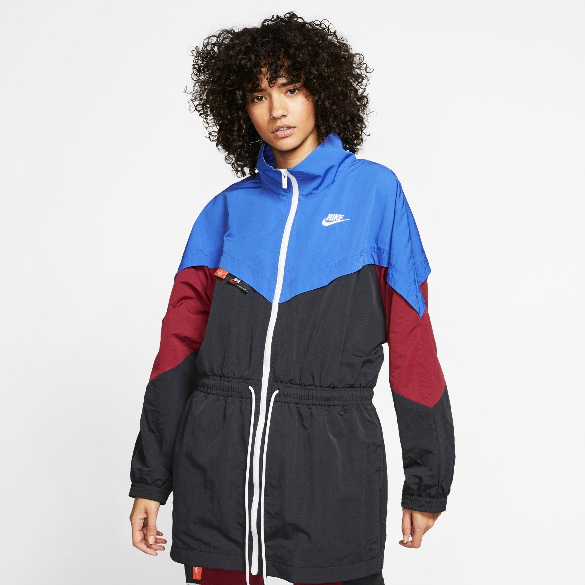 nike woven track top